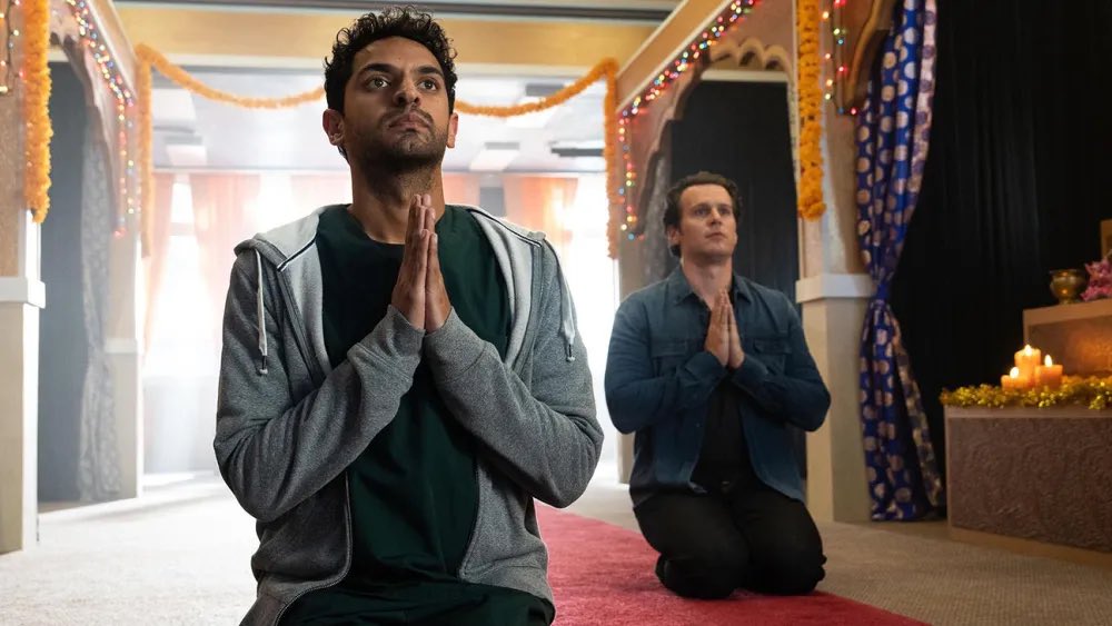 Karan Soni and Jonathan Groff in a Hindu temple in A Nice Indian Boy