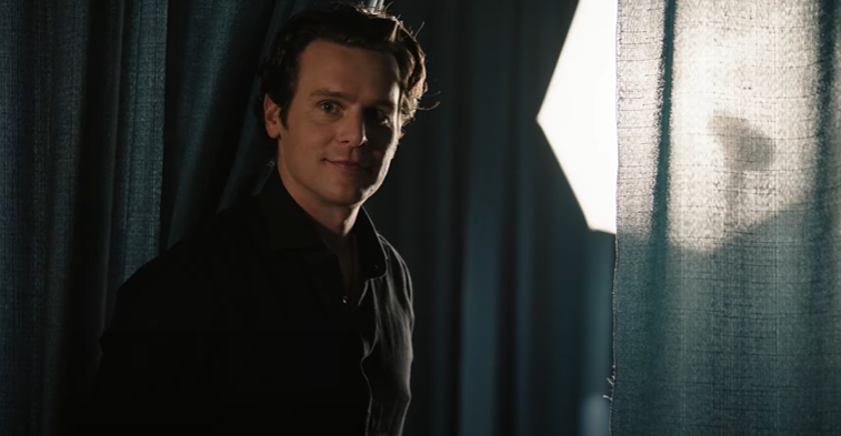 Jonathan Groff with a smile on his face in a still from A Nice Indian Boy trailer