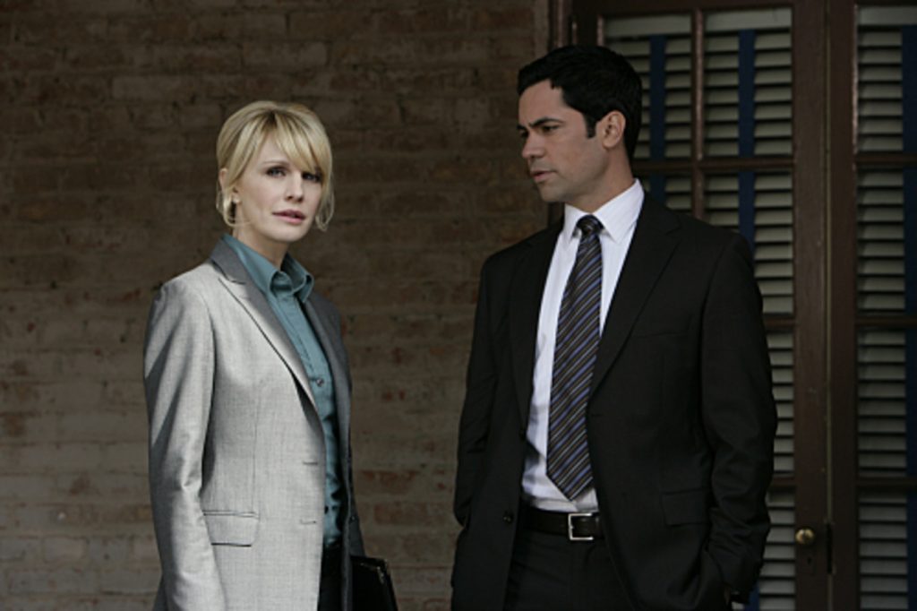 Danny Pino looking at Kathryn Morris in Cold Case 