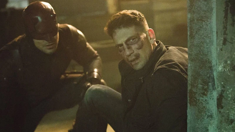 Jon Bernthal as the Punisher shares a scene with Daredevil in a still from the show Daredevil.