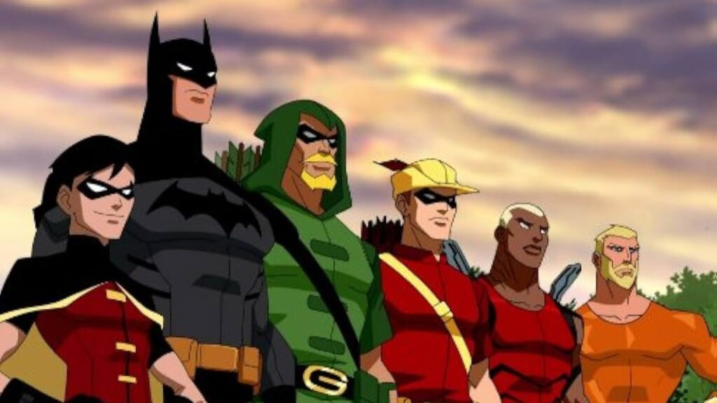 A scene from 'Young Justice' showing several DC superheroes standing together, including Batman, Green Arrow, Robin, and other Justice League members in their costumes against a sunset backdrop.