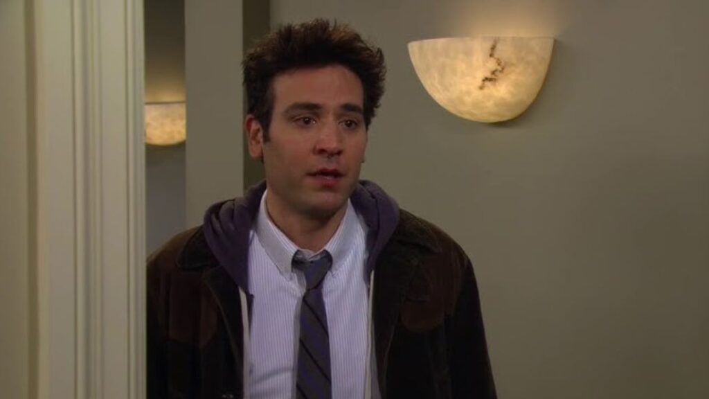 Josh Radnor standing with a sad expression in How I Met Your Mother