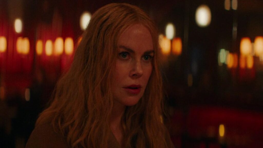 Nicole Kidman looking at someone in Babygirl 