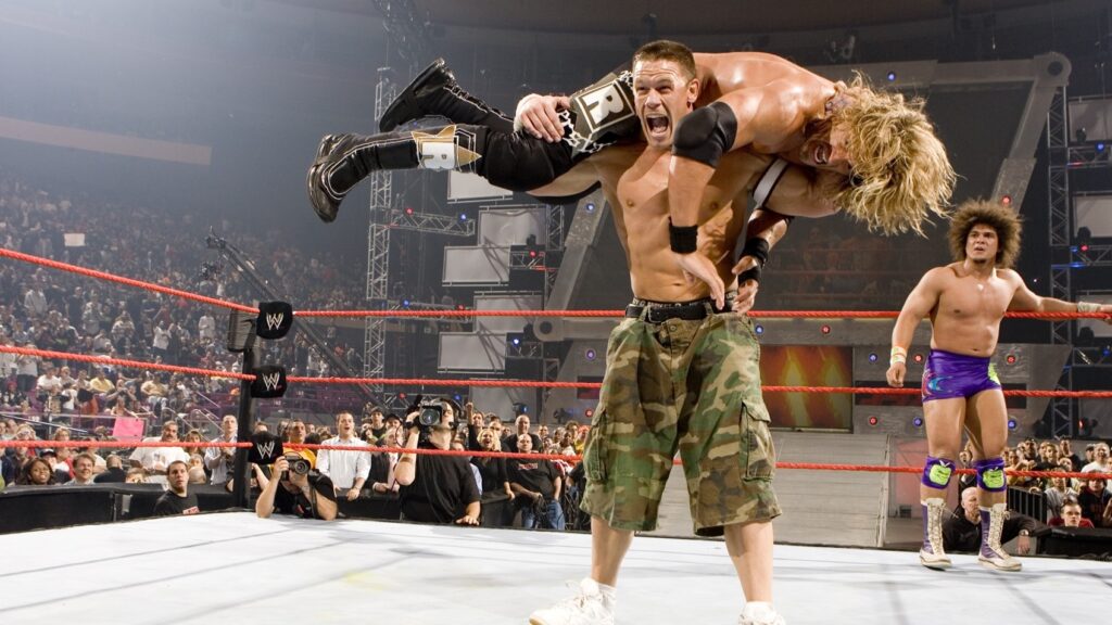 John Cena performing his signature move on Edge during a match.