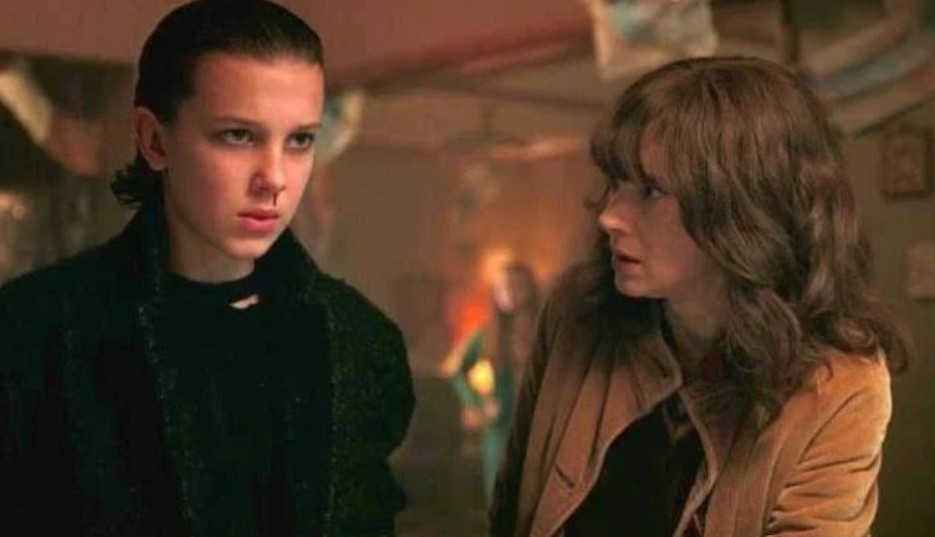 Winona Ryder as Joyce and Millie Bobby Brown as Eleven, in an intense scene from Stranger Things. 