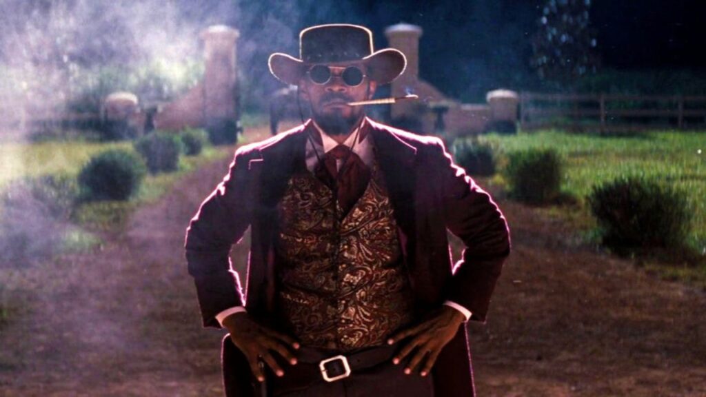 Jamie Foxx smoking while standing in Django Unchained