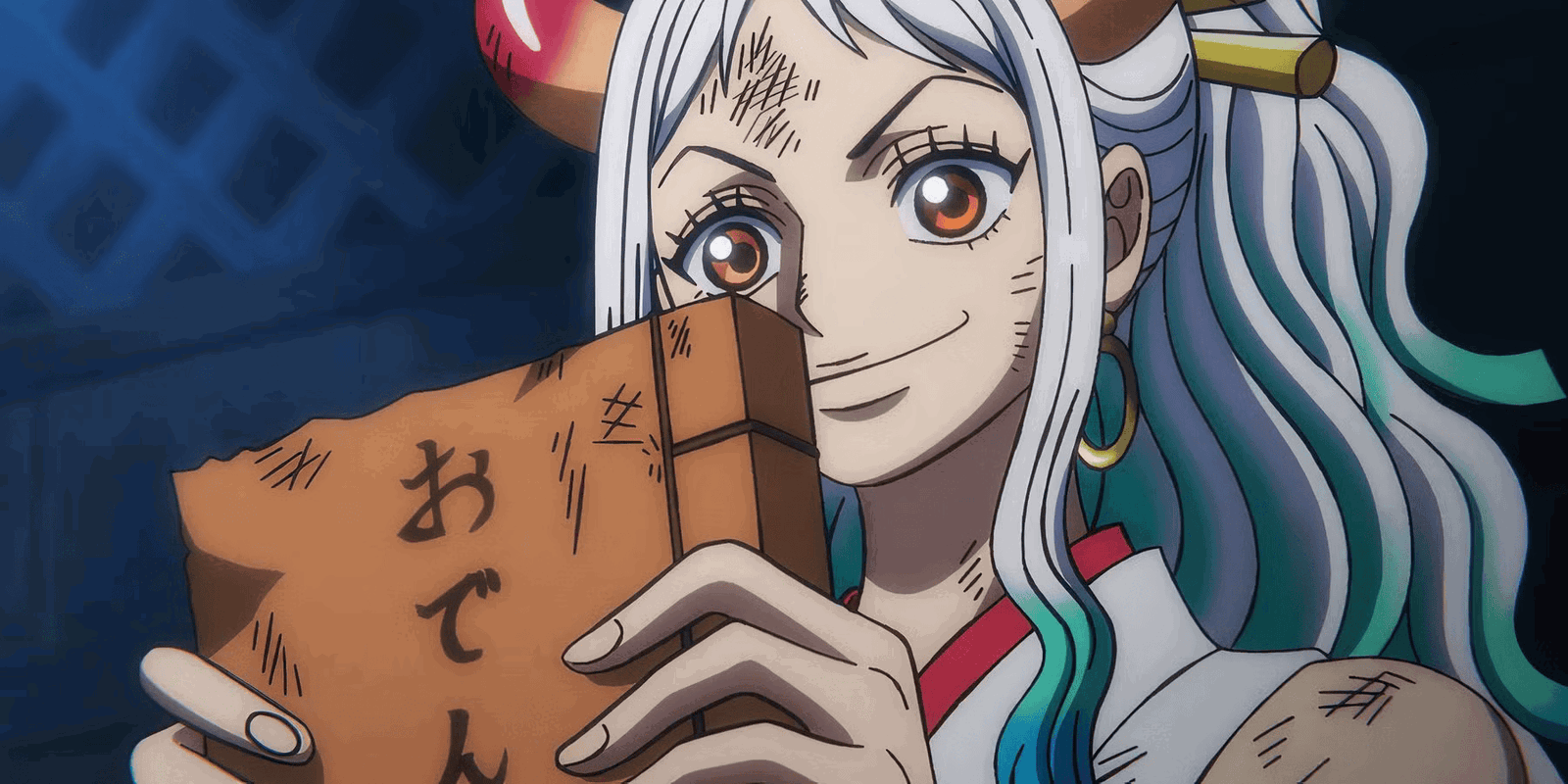 Yamato holding Oden's logbook in One Piece. 