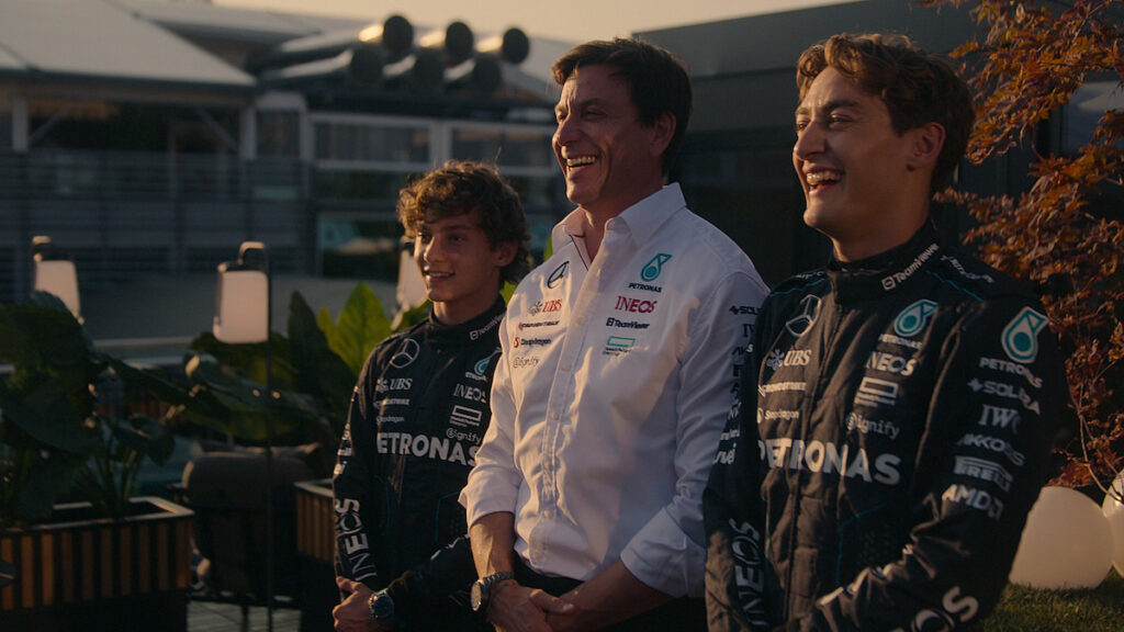 George Russell (R) with Mercedes team principal Toto Wolff and new teammate Kimi Antonelli (L) in Drive to Survive Season 7 Episode 3.