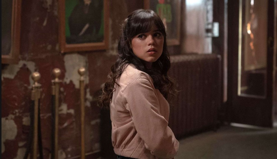 Jenna Ortega looking scared as Tara Carpenter in a tense moment from Scream VI.