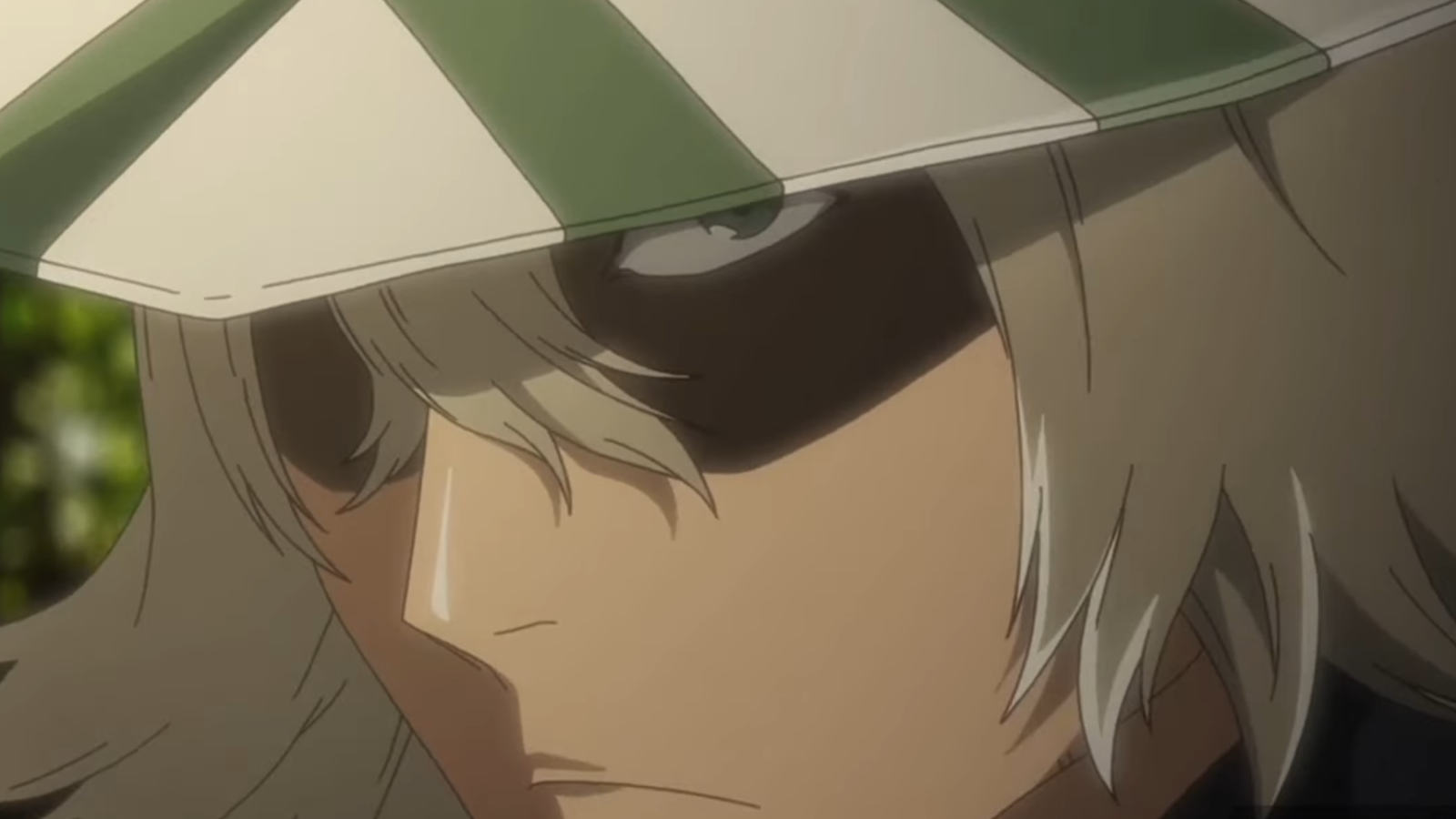 Kisuke Urahara looks suspicious as he has an evil expression on his face in Bleach anime 