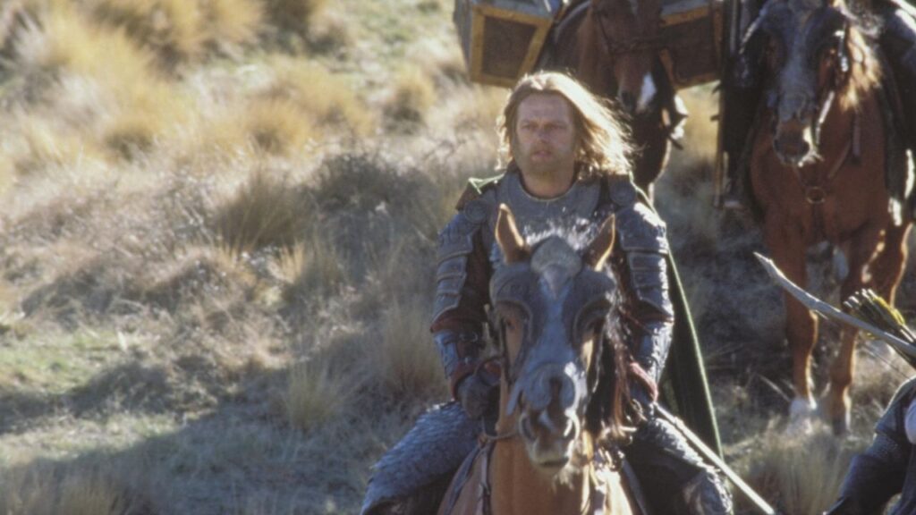 Gamling riding a horse in The Lord of the Rings