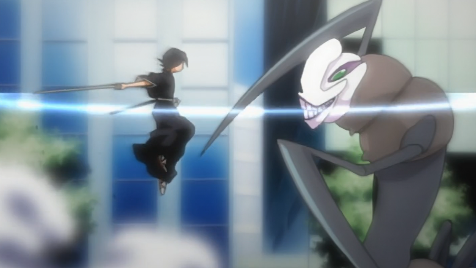 Rukia is slashing a Hollow with her sword in Tite Kubo’s Bleach anime 