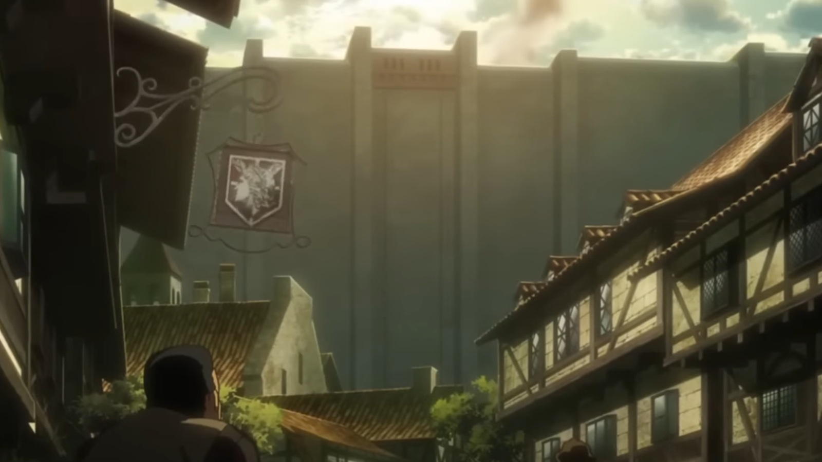 The picture shows the walls outside of Shiganshina district in Attack on Titan 