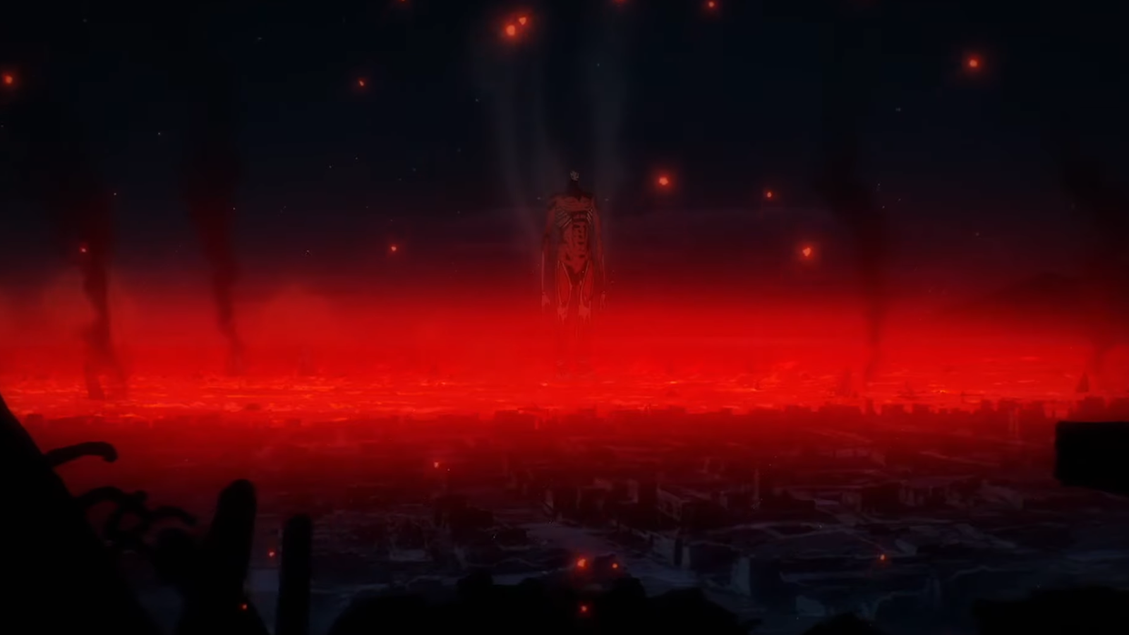 The colossal Titan is standing in the middle and there’s a blood red aura all around him