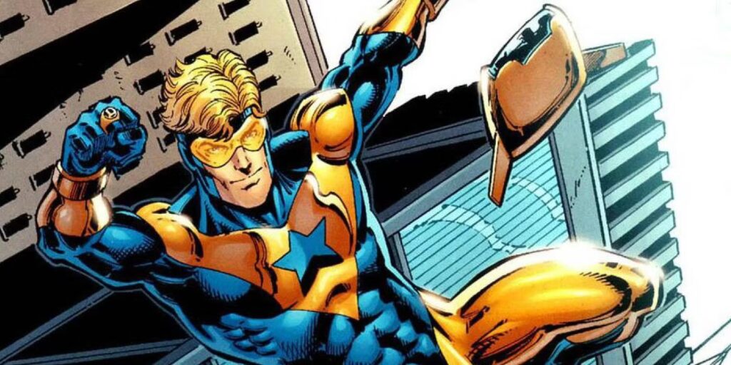 Booster Gold smiling and striking a pose mid air