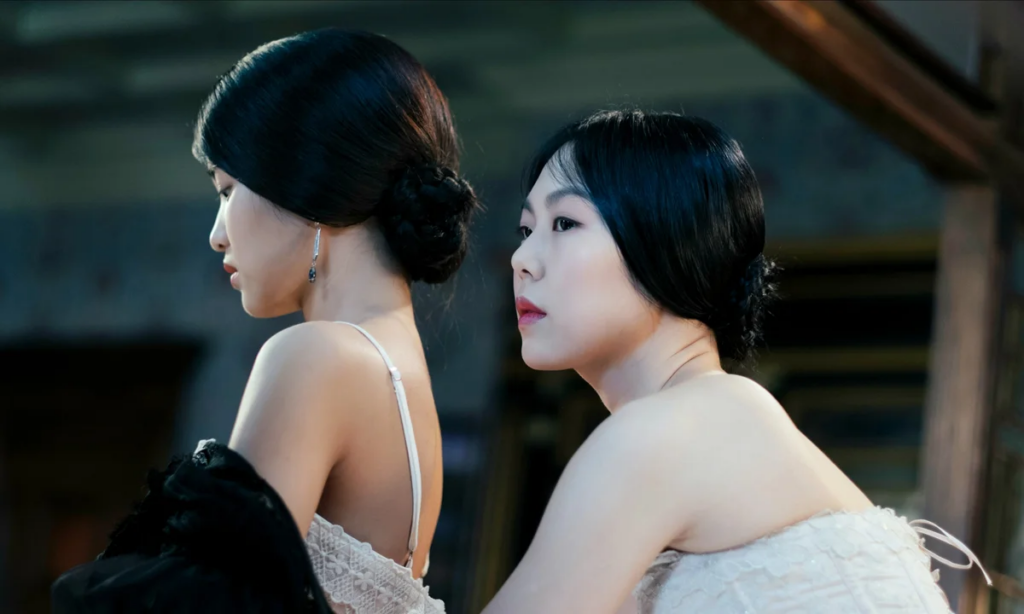 Two characters looking in The Handmaiden