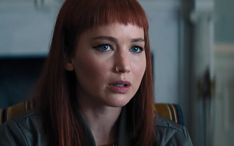 Jennifer Lawrence, in red hair, in her Netflix movie Don’t Look Ip