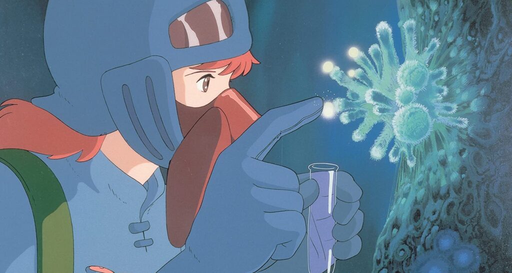 Is This Anime Really Better Than Studio Ghibli’s Best Movie Yet? 3 Nausicaä examines a glowing spore in her protective gear.