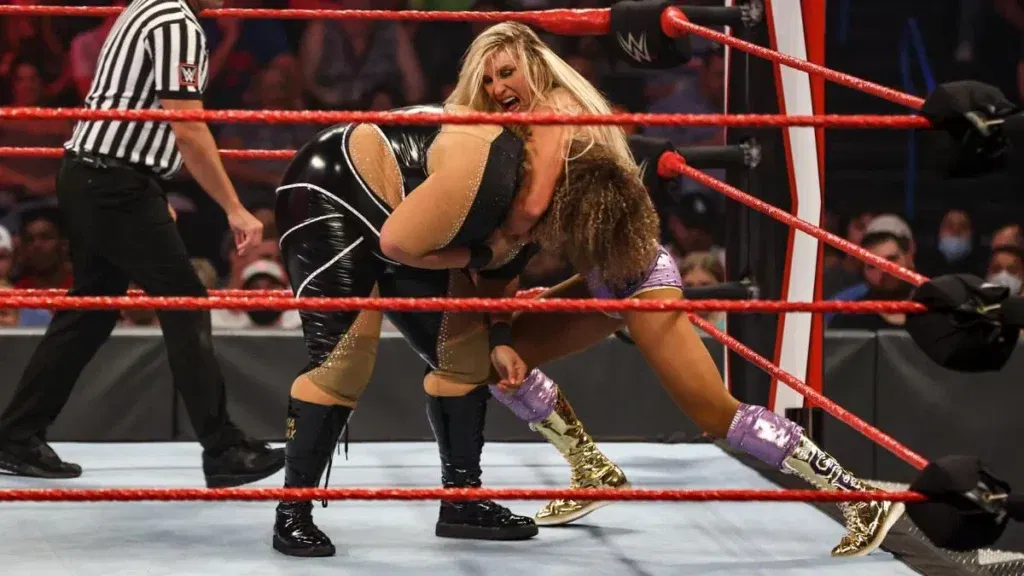 Nia Jax wrestling Charlotte Flair.