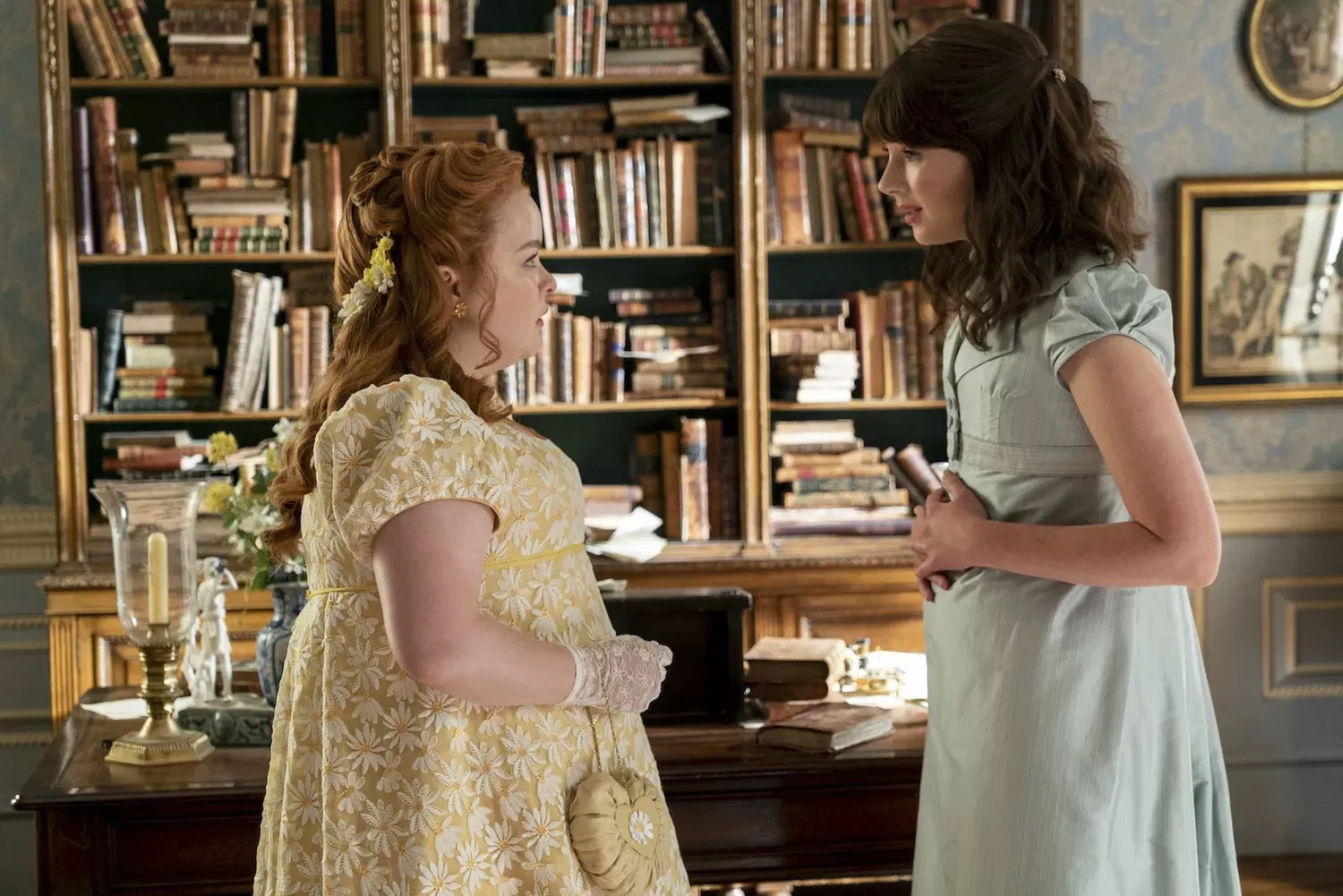 Penelope Featherington (Nicola Coughlan) and Eloise Bridgerton (Claudia Jessie) in a still from Season 2. Credit: Netflix