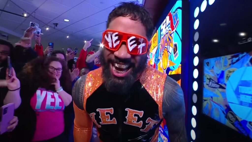 Jey Uso entering through the WWE crowd