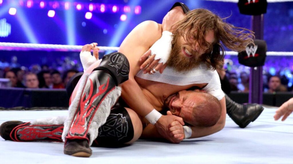 Daniel Bryan attacking his rival.