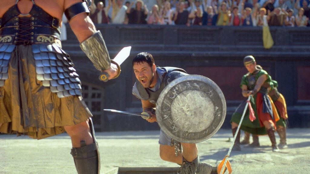 Russell Crowe charging towards his opponent