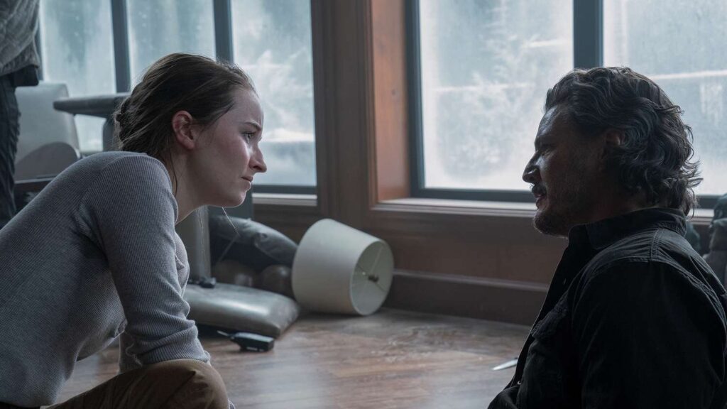 HBO’s ‘The Last of Us’ Season 2 Exposed an Ugly Truth About Joel and Abby's Saga Few Game Fans Noticed 1 Abby looking seriously at Joel who's sitting by a table in The Last of Us.