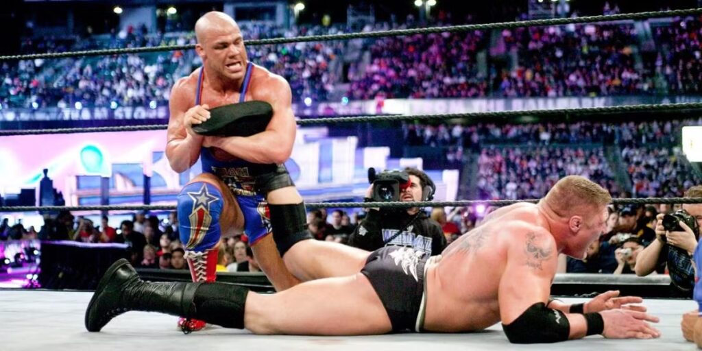 Kurt Angle attacking his rival. 