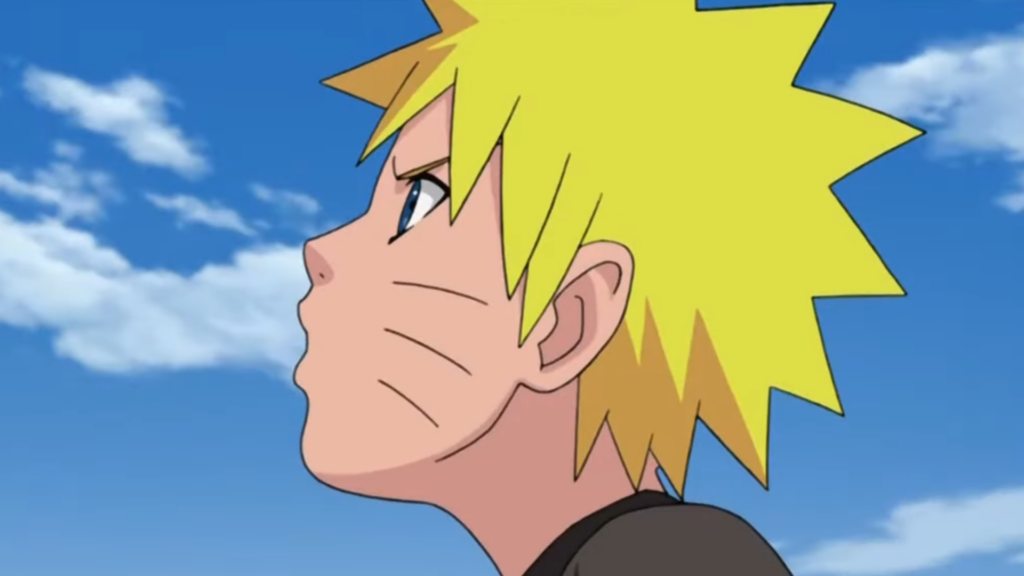 Young Naruto is looking up at sky and can be seen pouting in a still
