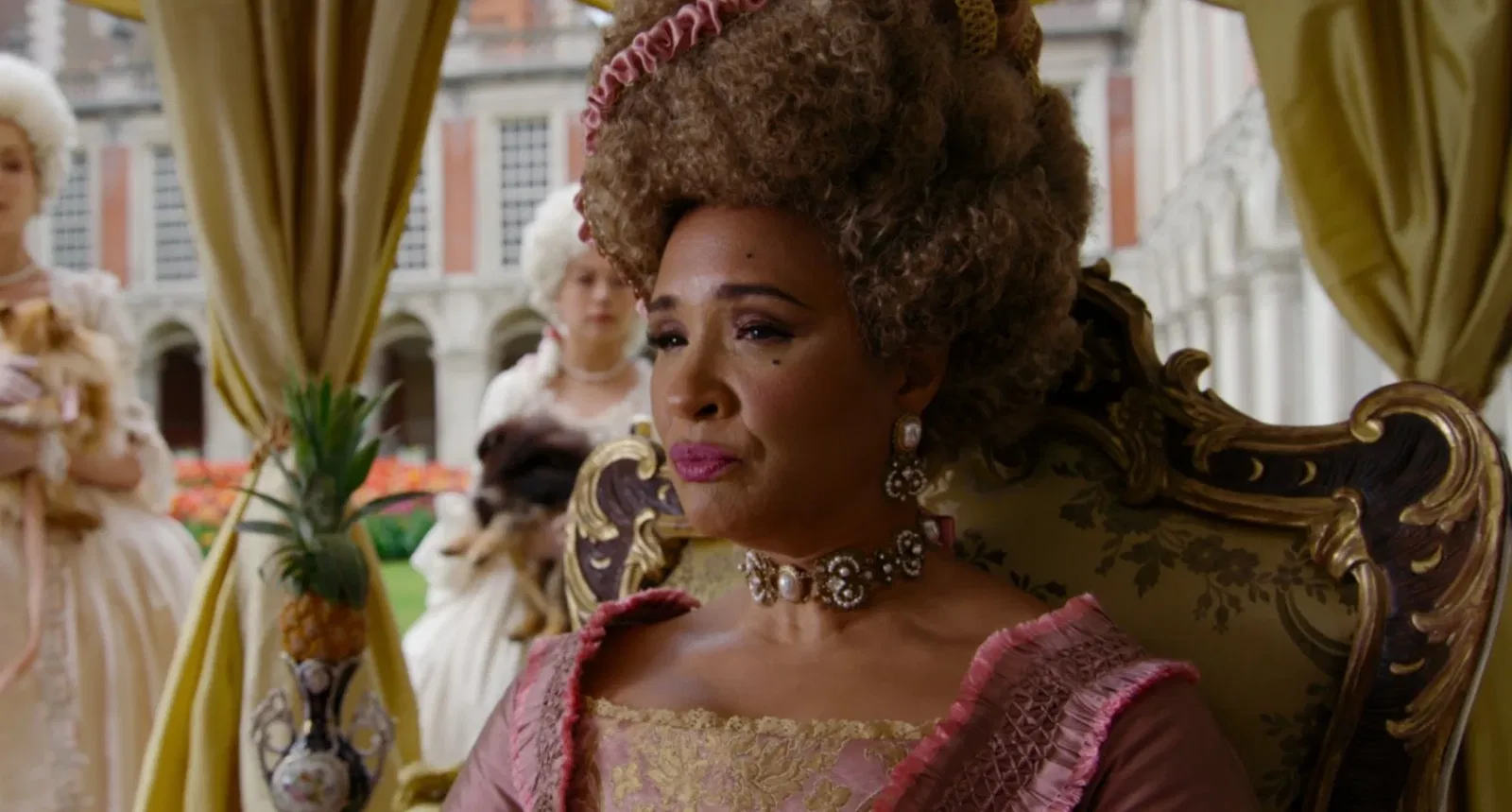 Golda Rosheuvel wearing a heavy wig in a still from Bridgerton