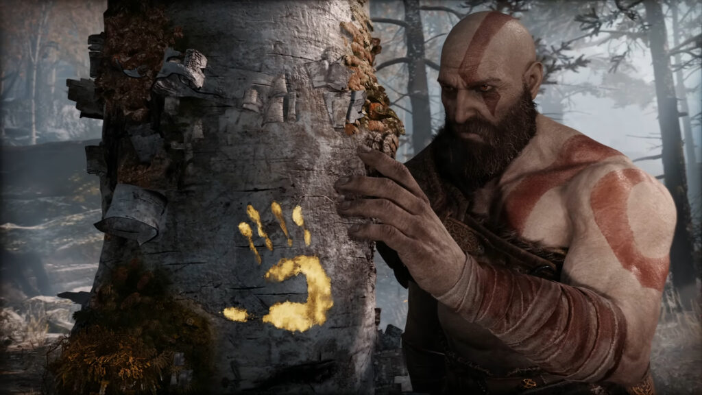 Kratos Isn’t a Boxer - God of War’s Combat Had to Feel Like Raw Fury 5 God of War scene showing an emotional Kratos touching a tree in remembrance of his late wife.