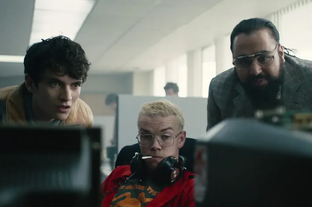 Fionn Whitehead, Will Poulter, and Asim Chaudhry in Black Mirror: Bandersnatch
