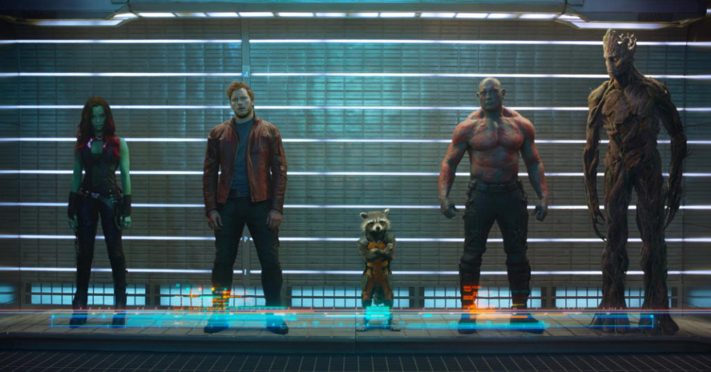 “I had seen something new”: Steven Spielberg’s Past Comment Is Great Marketing for James Gunn’s Superman 1 Gamora, Peter, Rocket, Drax, and Groot standing in front of a glass wall and looking ahead in a still from James Gunn's Guardians of the Galaxy.