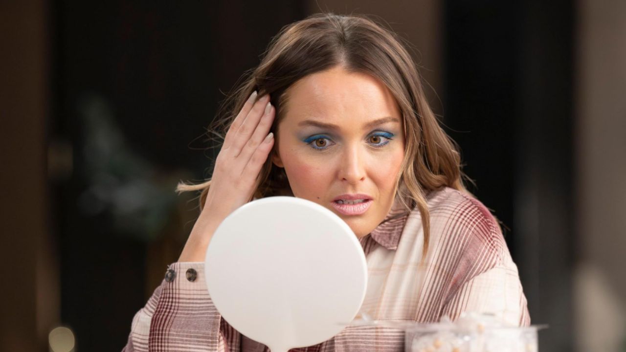 Camilla Luddington looking at the mirror in Grey's Anatomy