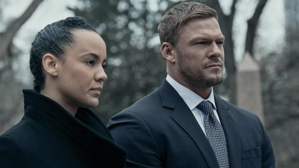 Maria Sten and Alan Ritchson standing side-by-side