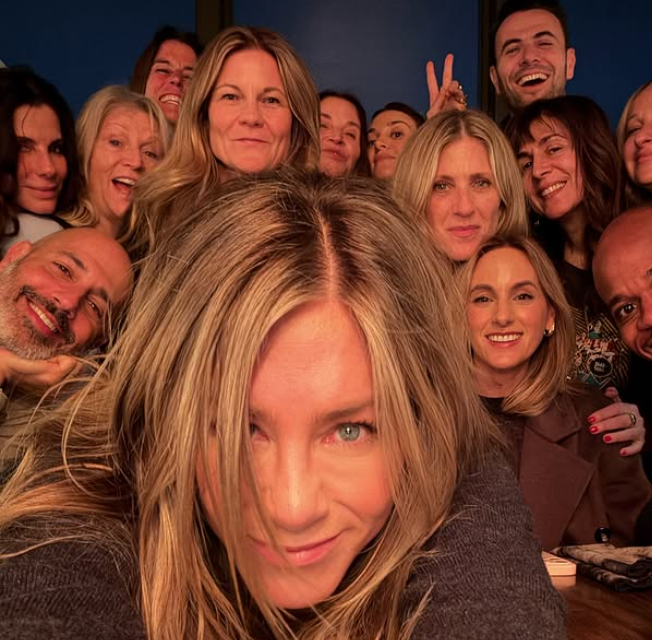 Jennifer Aniston takes a selfie with friends