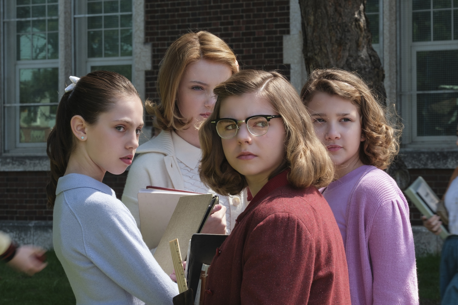 A group of girls in a still from IT: Welcome to Derry.