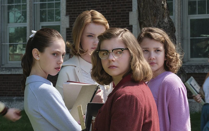 A group of girls in a still from IT: Welcome to Derry.