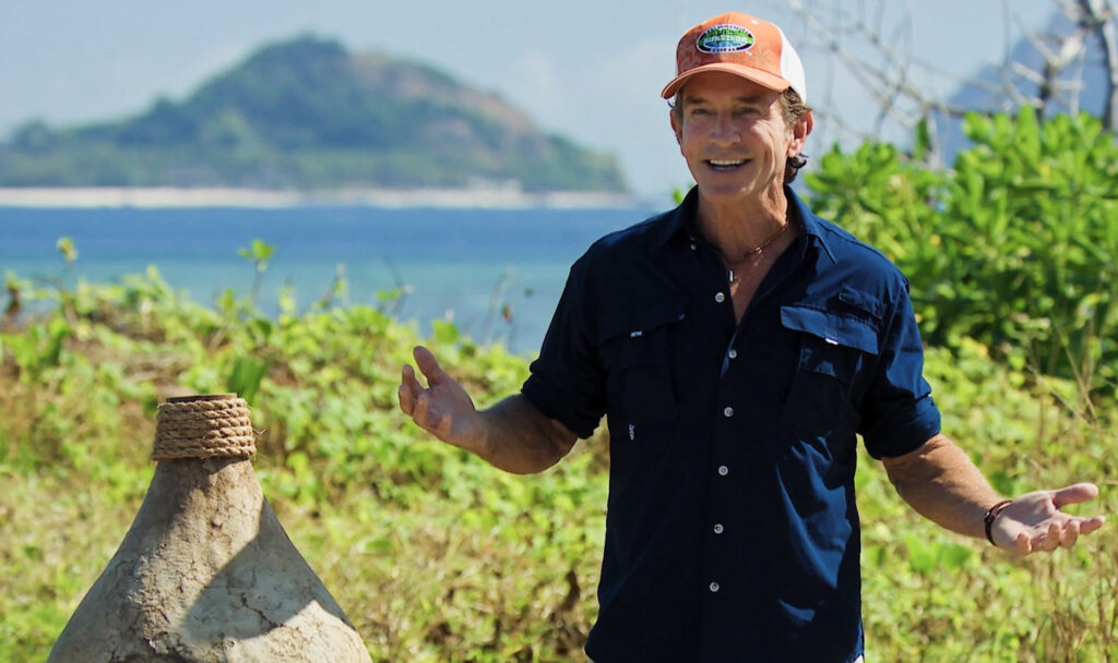 Jeff Probst smiling in a still from Survivor.