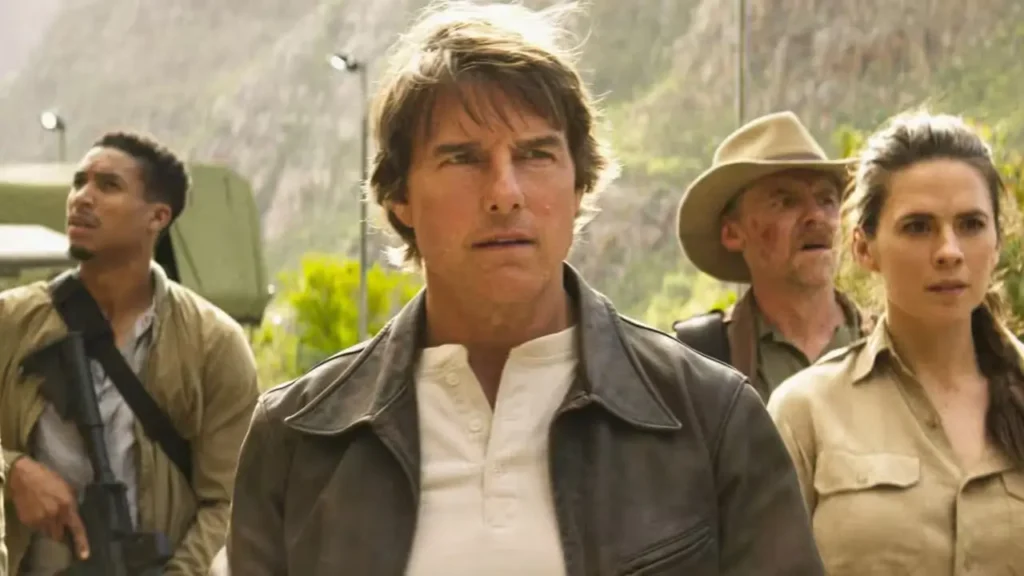 ‘Mission: Impossible – The Final Reckoning’ Ending Explained: Did Ethan Hunt Save the World From Its Grim Fate 3 Greg Tarzan Davis, Tom Curise, Simon Pegg, and Hayley Atwell in a still from Mission: Impossible - The Final Reckoning wearing safari attire.