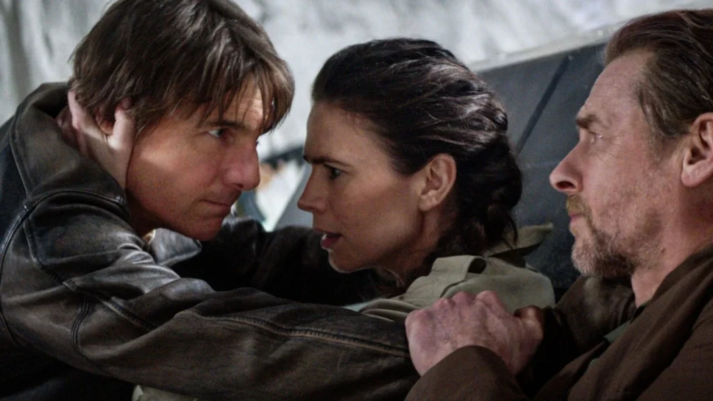 ‘Mission: Impossible – The Final Reckoning’ Ending Explained: Did Ethan Hunt Save the World From Its Grim Fate 5 Tom Cruise assuring Simon Pegg and embracing Hayley Atwell in a still from Mission: Impossible - The Final Reckoning