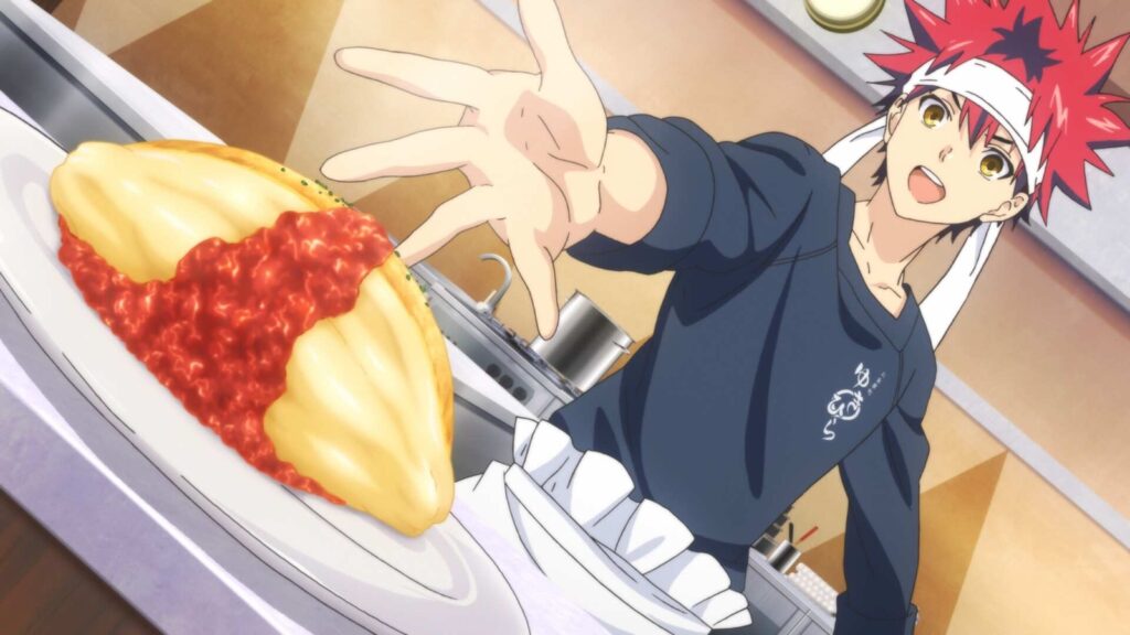 Soma is presenting a freshly prepared dish, specifically an omurice.
