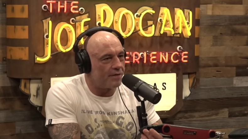 Joe Rogan's Unfiltered Reaction to Elon Musk's Twitter Feud With Donald Trump and Epstein's Files Claims 2 Joe Rogan wearing headphones and speaking on his podcast