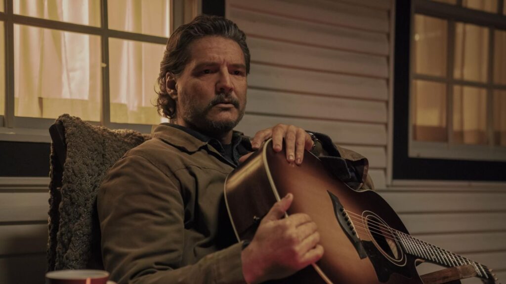 Pedro Pascal Lies Before Confessing His Weird Habit That Many Celebrities Avoid 4 Pedro Pascal holding up a guitar.