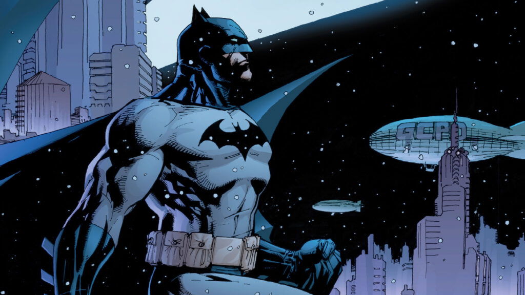 Batman in his grey and blue suit looking up in a comic panel.