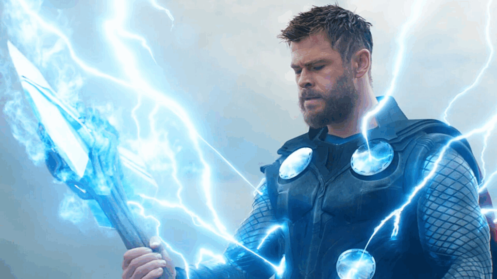 Ted Lasso Star's Next Marvel Project Reportedly Not Thor 5 2 Chris Hemsworth wielding a weapon while in his Thor costume.