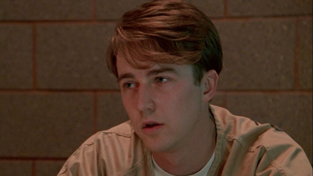 Edward Norton in a beige colored fit 