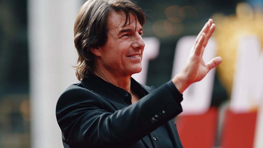 Brad Pitt Reveals if Tom Cruise Beat Him at Racing After His Only Condition To Work Together Again 5 Tom Cruise waving