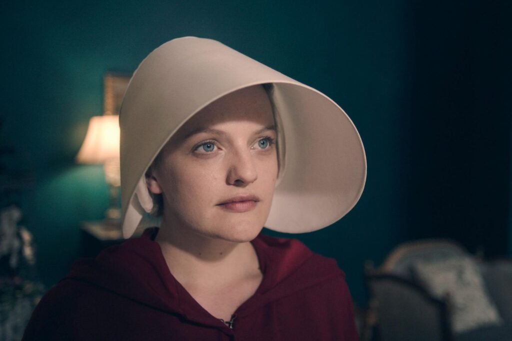June wearing a white cap on The Handmaid's Tale.